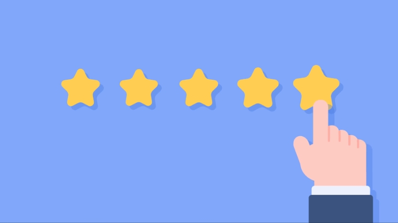 Image of a hand selecting a star in a rating system, representing customer satisfaction goals for a performance review