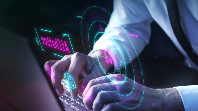 Hands typing on a laptop with digital AI graphics, symbolizing strategies for implementing AI tools in HR